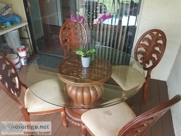 Tropical wood dining table and 4 chairs 60in round