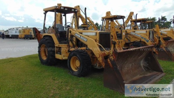 1996 John Deere 710D backhoe front loader