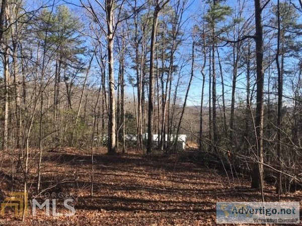 Beautiful mountain views from a private acre lot available for s