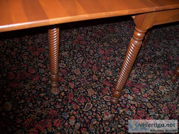 Consider H. Willett label on chairs. It is a drop leaf table wit