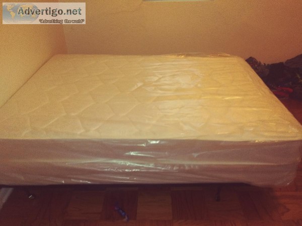 Full size bed boxspring and frame. Brand new in plastic