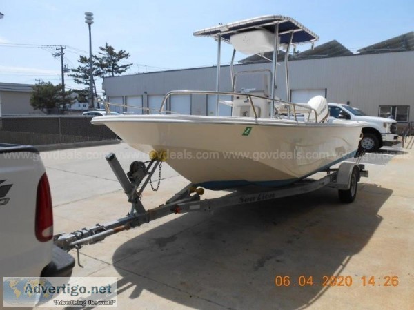 2015 CAROLINA SKIFF 198 W EVINRUDE 115  SEA LION TRAILER