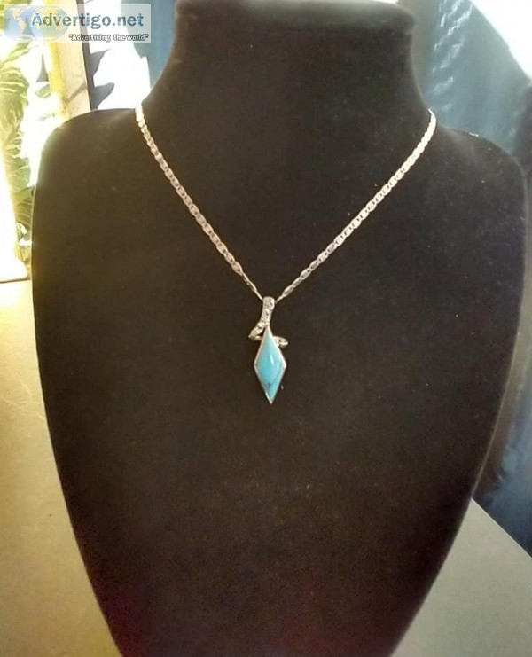 TurquoiseTopaz 925 sterling silver necklace with 16 inch chain..