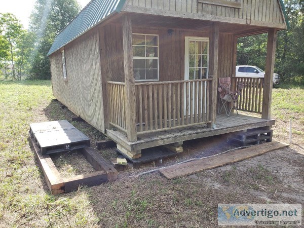 Trade nice metal roofed yard barn for camper.