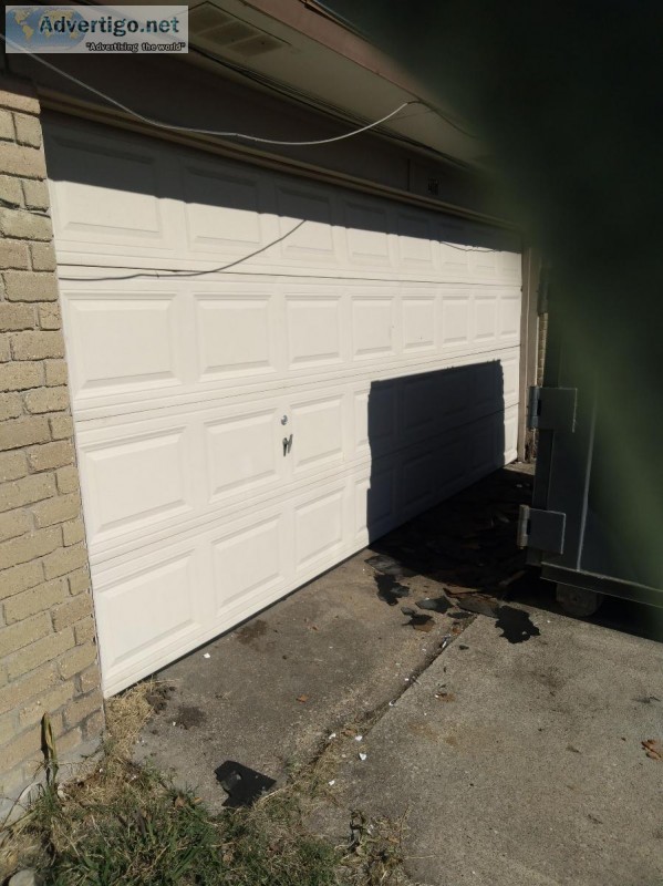 Experienced garage door technician repairs installs highest qual