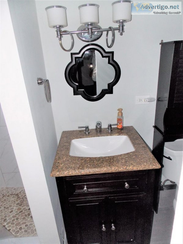 Bathroom Vanity With Granite Top Mirror and Light