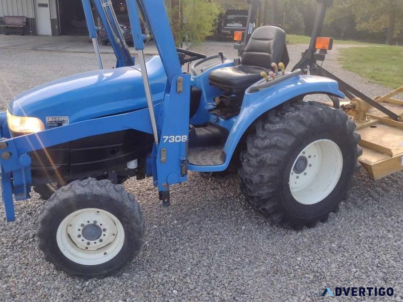 2002 New Holland 4wd Tractor and Shredder. With Front end Loader