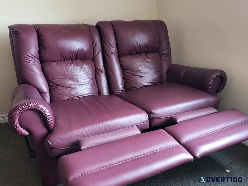 Leather burgundy twin recliner sofa