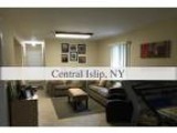 Foreclosure Single Family Home for sale in Central Islip NY