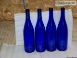 Drilled blue wine bottles