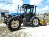 1999 NEW HOLLAND TRACTOR WITH ALAMO FLAIL MOWER