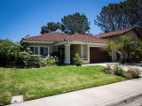 Living is easy in this impressive generously sized one-story hom