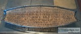 Woven Wicker and Metal Canoe Shaped Basket