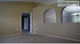 Family room with Sliders to screened porch that overlooks fully 