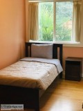 Furnished bedroom with private bathroom