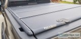 Foldable truck bed cover