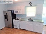 Kitchen Cabinets With Corian Counter And All Appliances