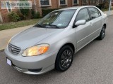 2003 Toyota Corolla. Silver wBlack leather.