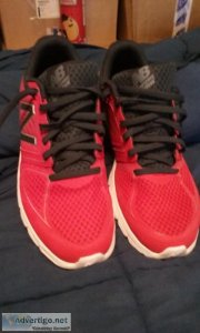 New Balance red running tennis shoes