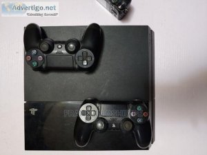 NEATLY USED PS4 WITH TWO WORKING GAME PADS
