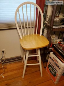 Wooden chair with white high back