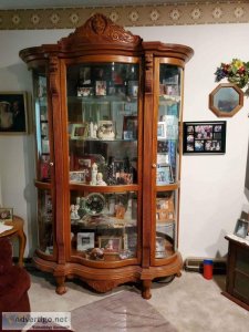 Large wooden lion head curio cabinet