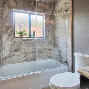 Shower screen for baths